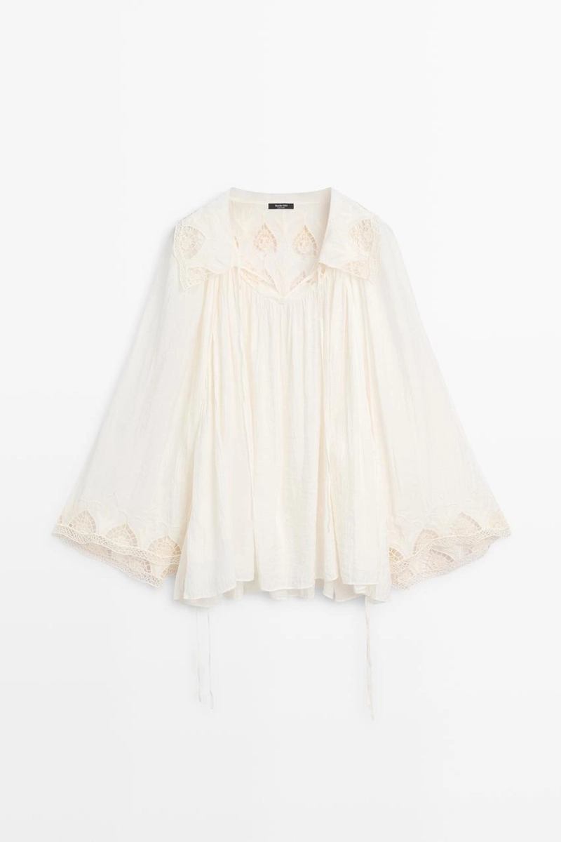 Вышитая блузка в полупрозрачной ткани