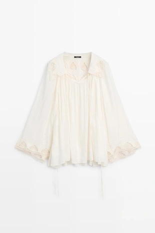 Вышитая блузка в полупрозрачной ткани- Заказать в России