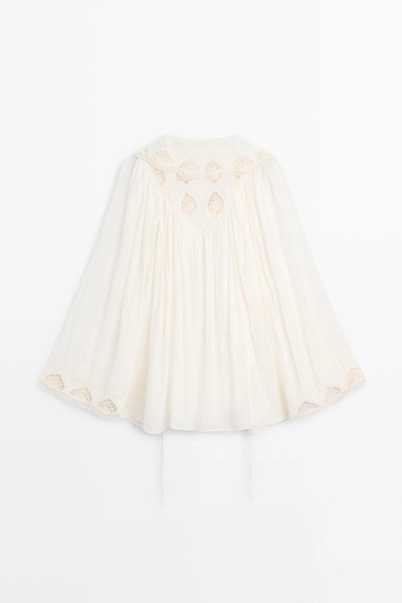 Вышитая блузка в полупрозрачной ткани