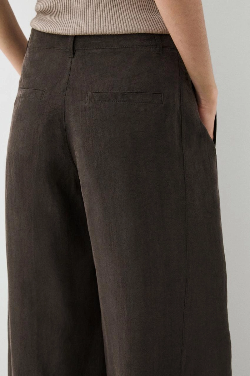 Широкие брюки с кантами