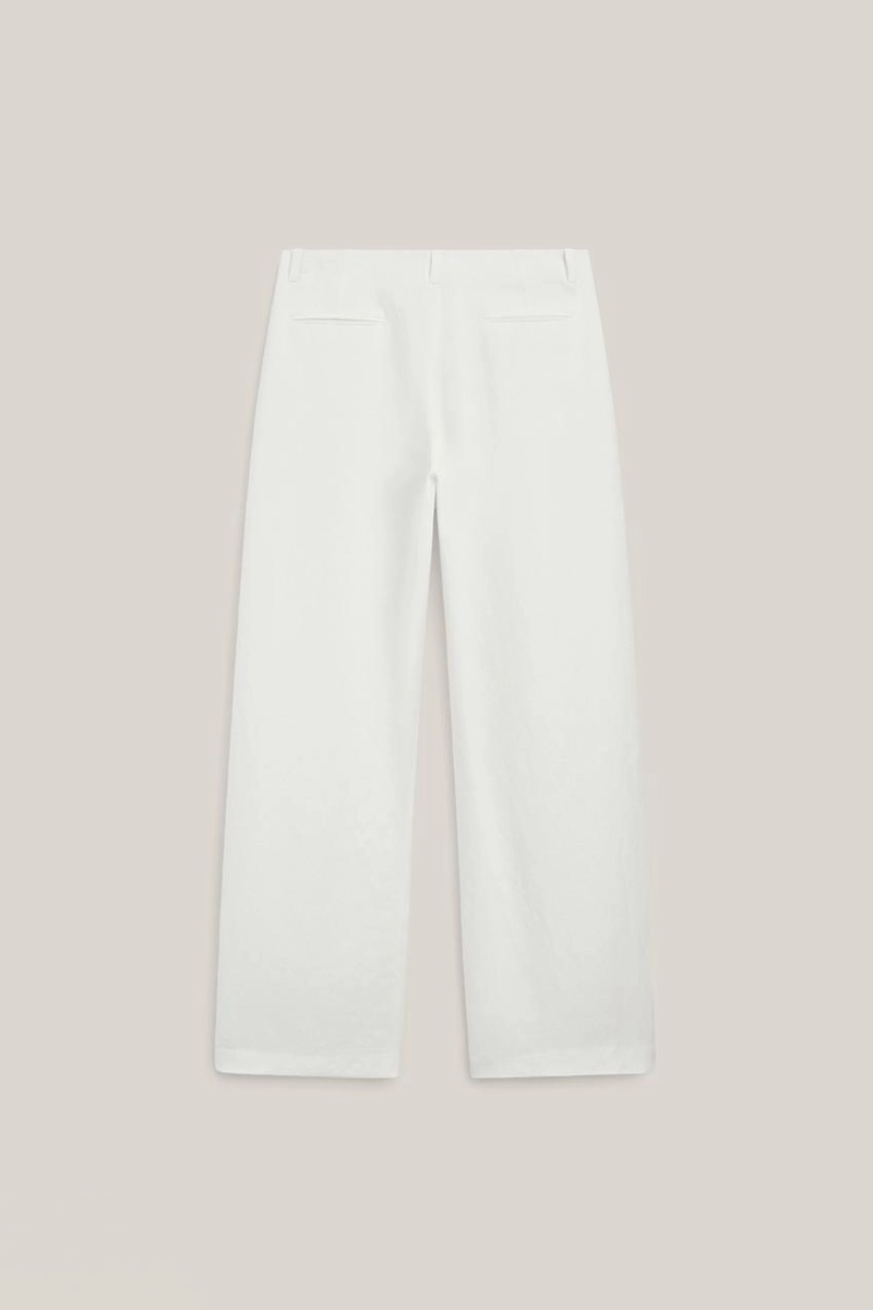 Брюки из льняной смеси с защипами - лимитированная коллекция