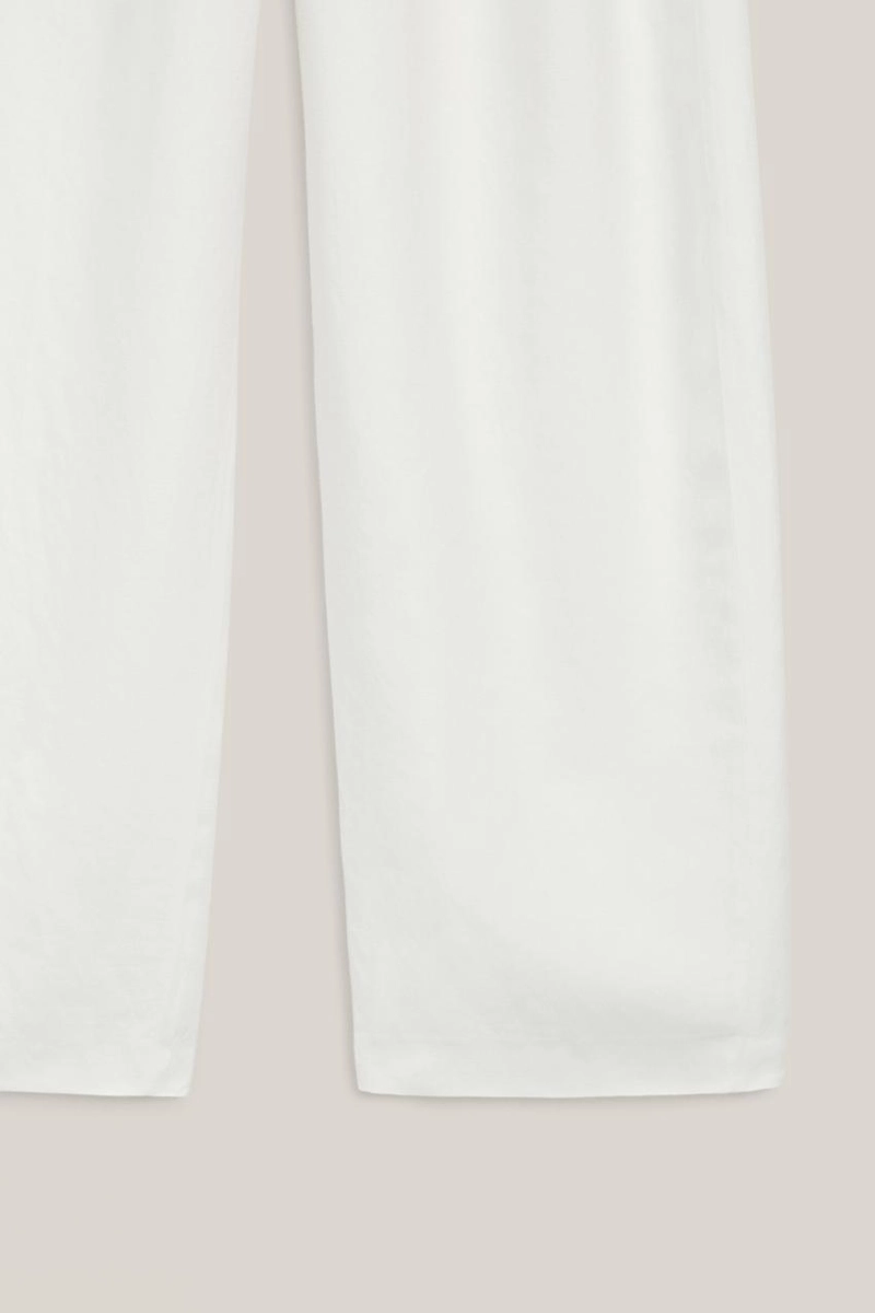 Брюки из льняной смеси с защипами - лимитированная коллекция