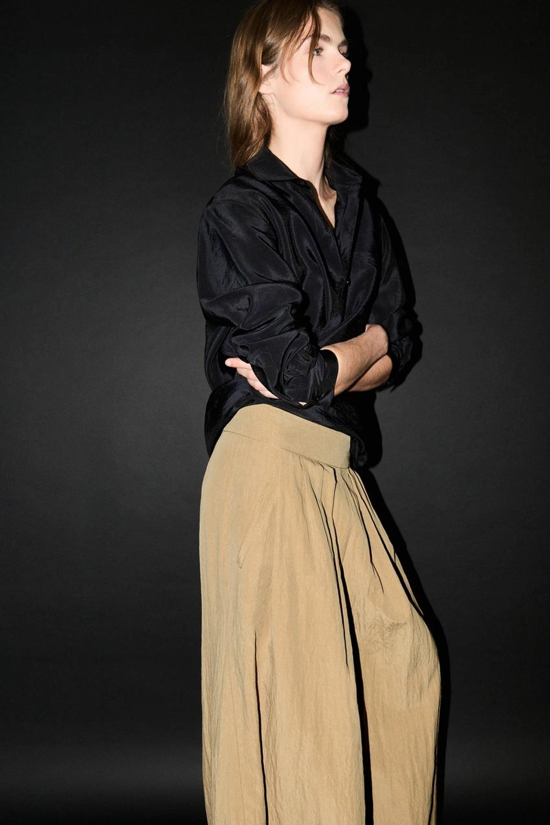 Брюки палаццо с накладными складками