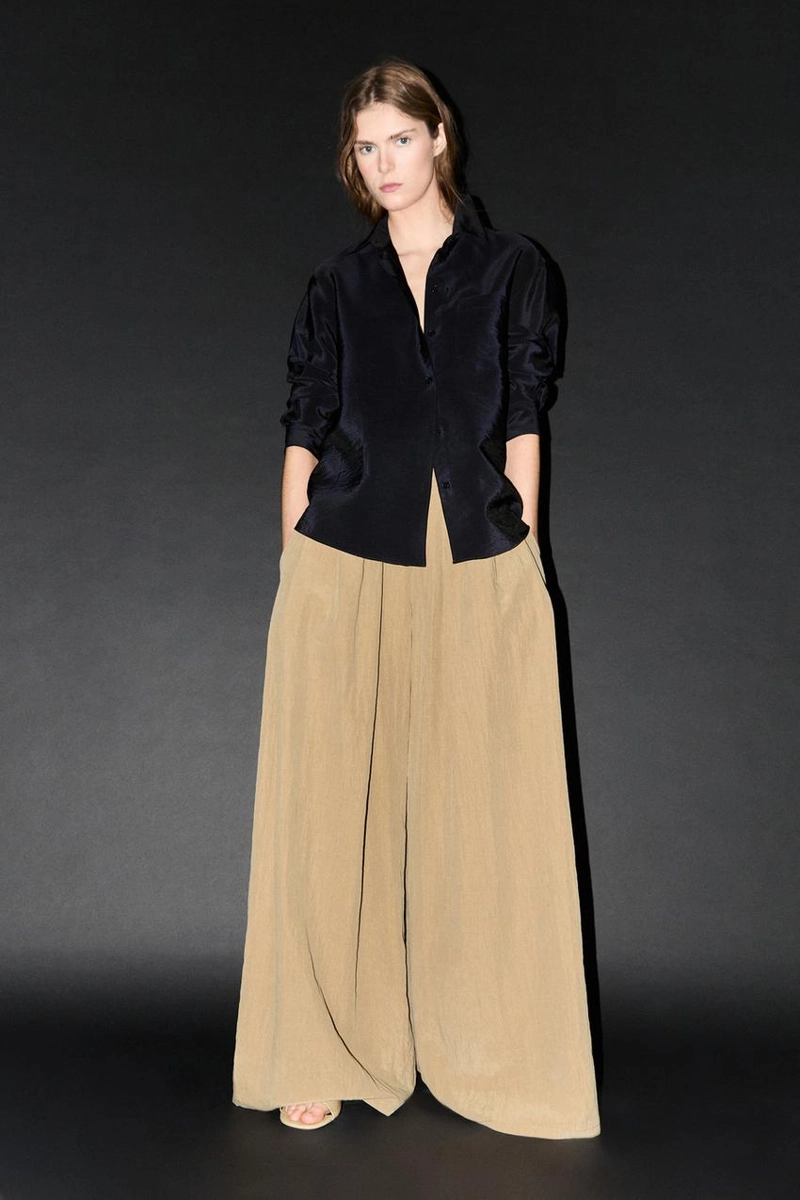 Брюки палаццо с накладными складками