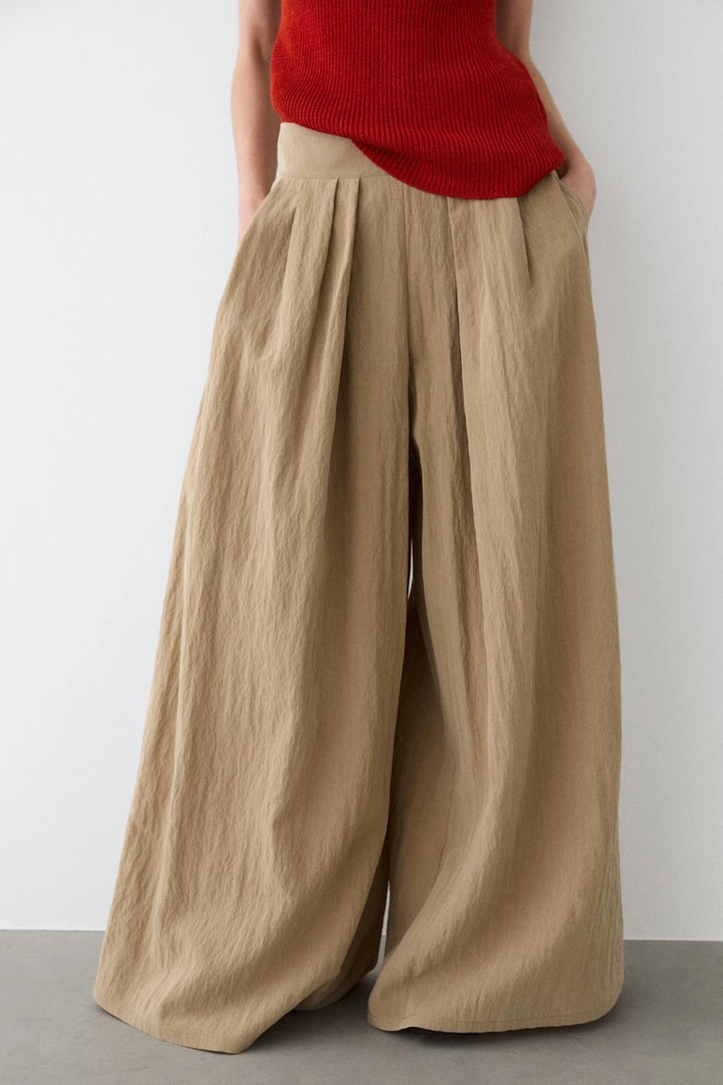 Брюки палаццо с накладными складками