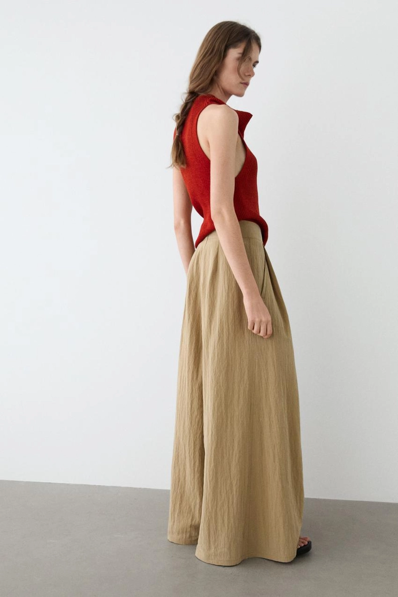 Брюки палаццо с накладными складками