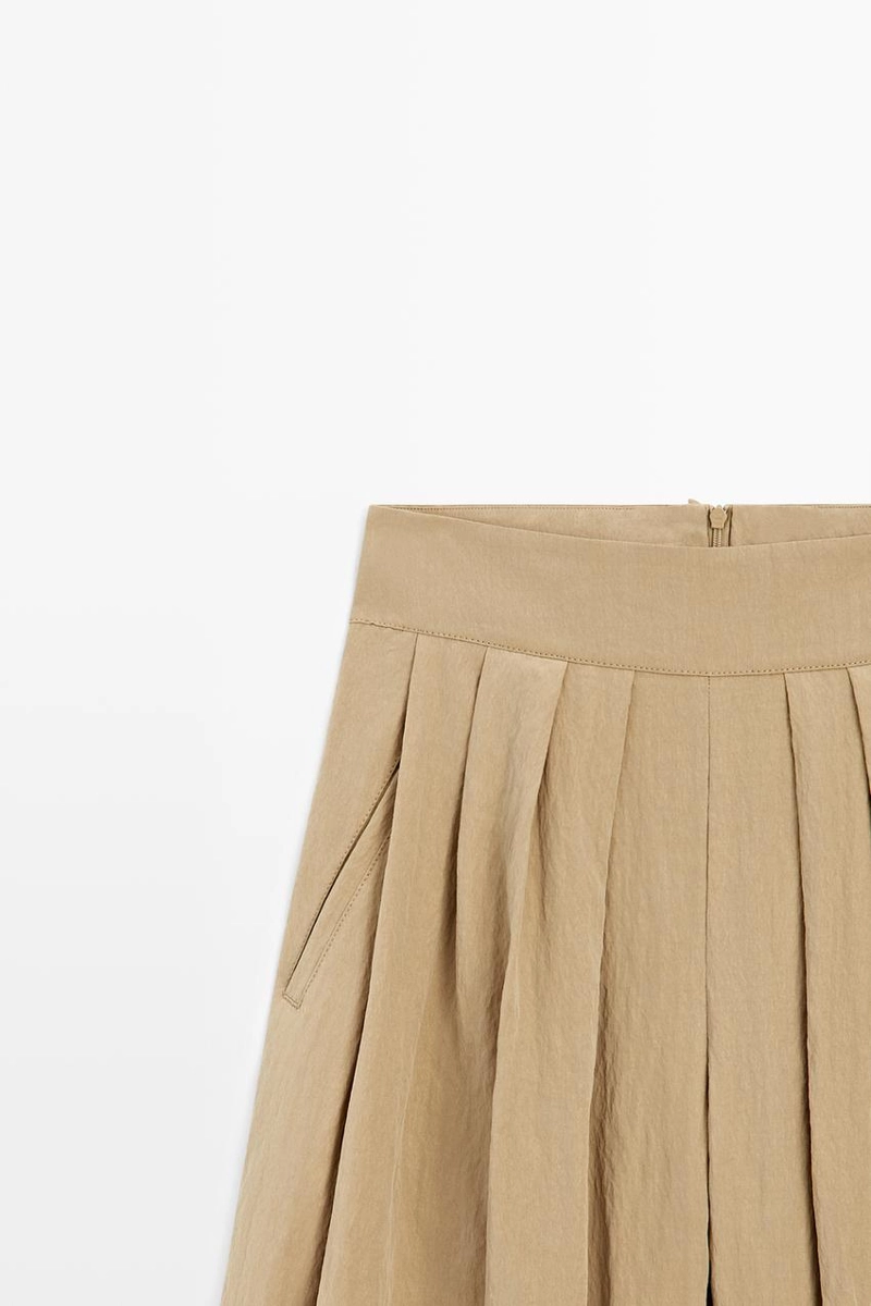 Брюки палаццо с накладными складками