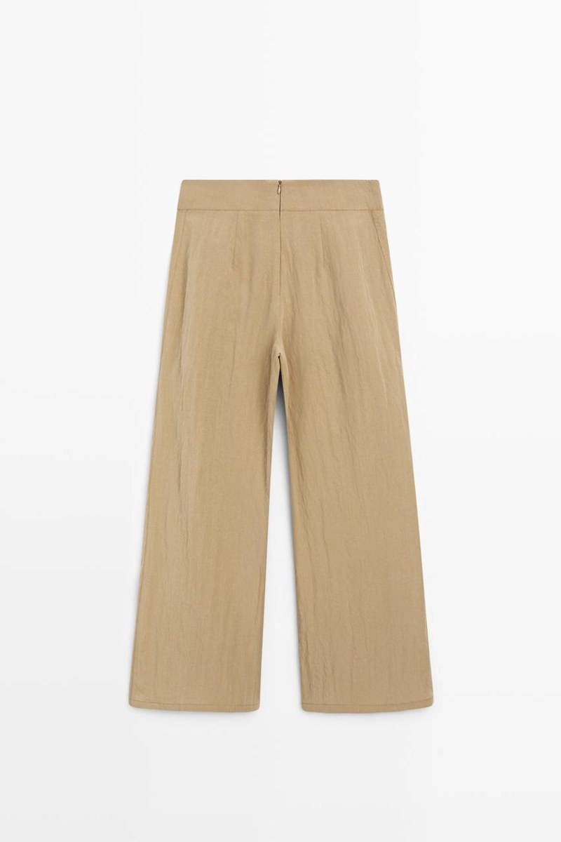 Брюки палаццо с накладными складками