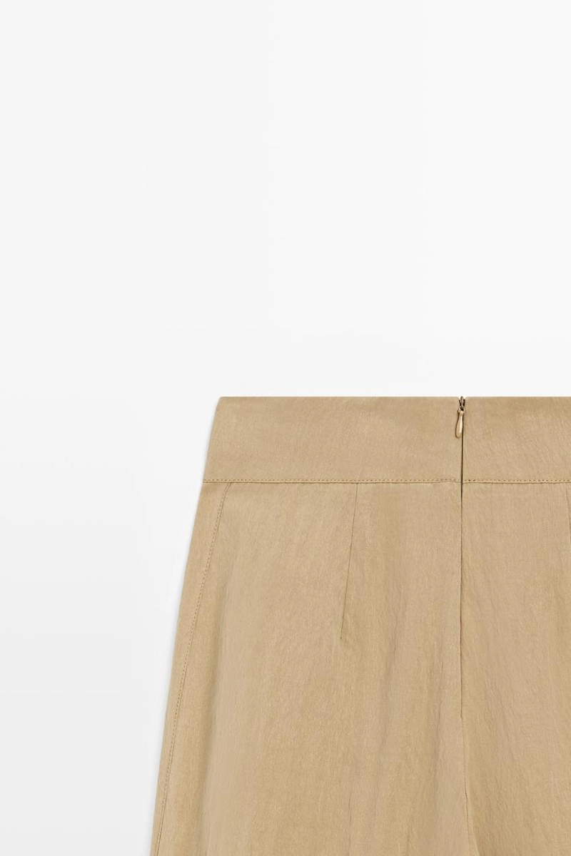 Брюки палаццо с накладными складками