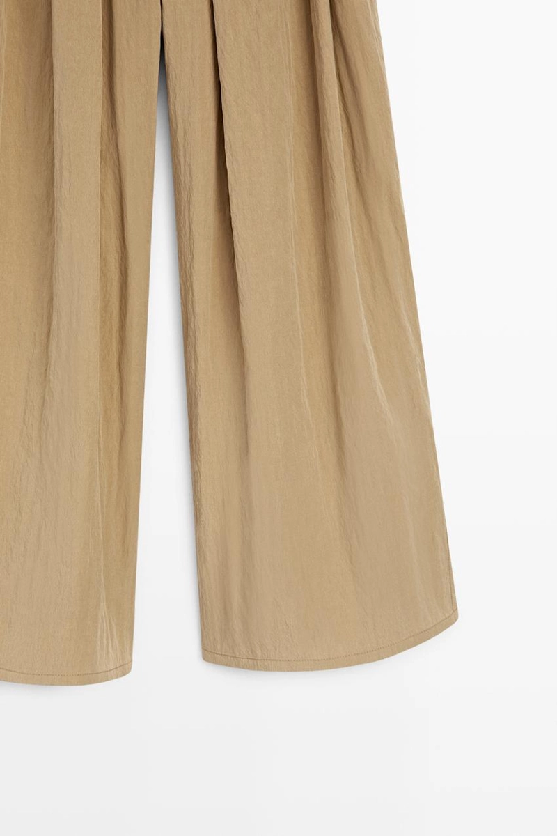 Брюки палаццо с накладными складками