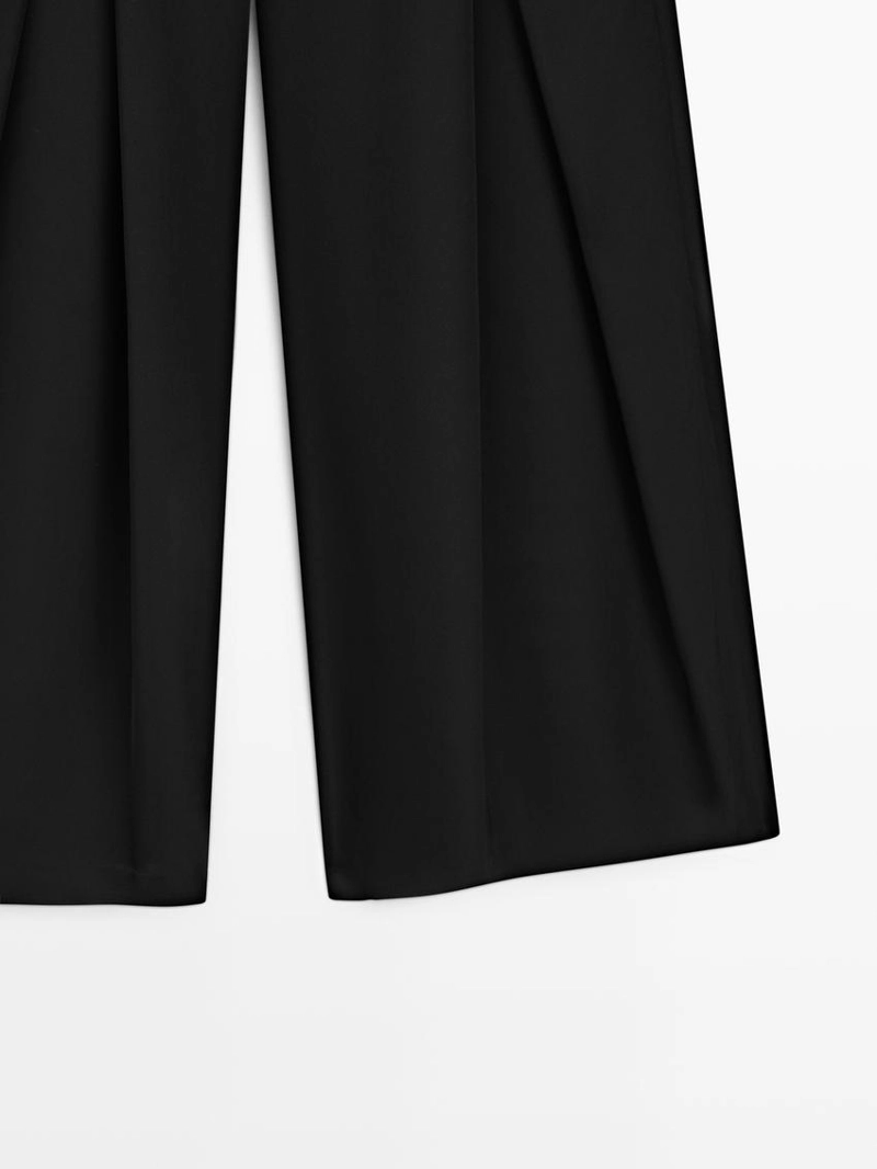 Брюки из атласа с защипами