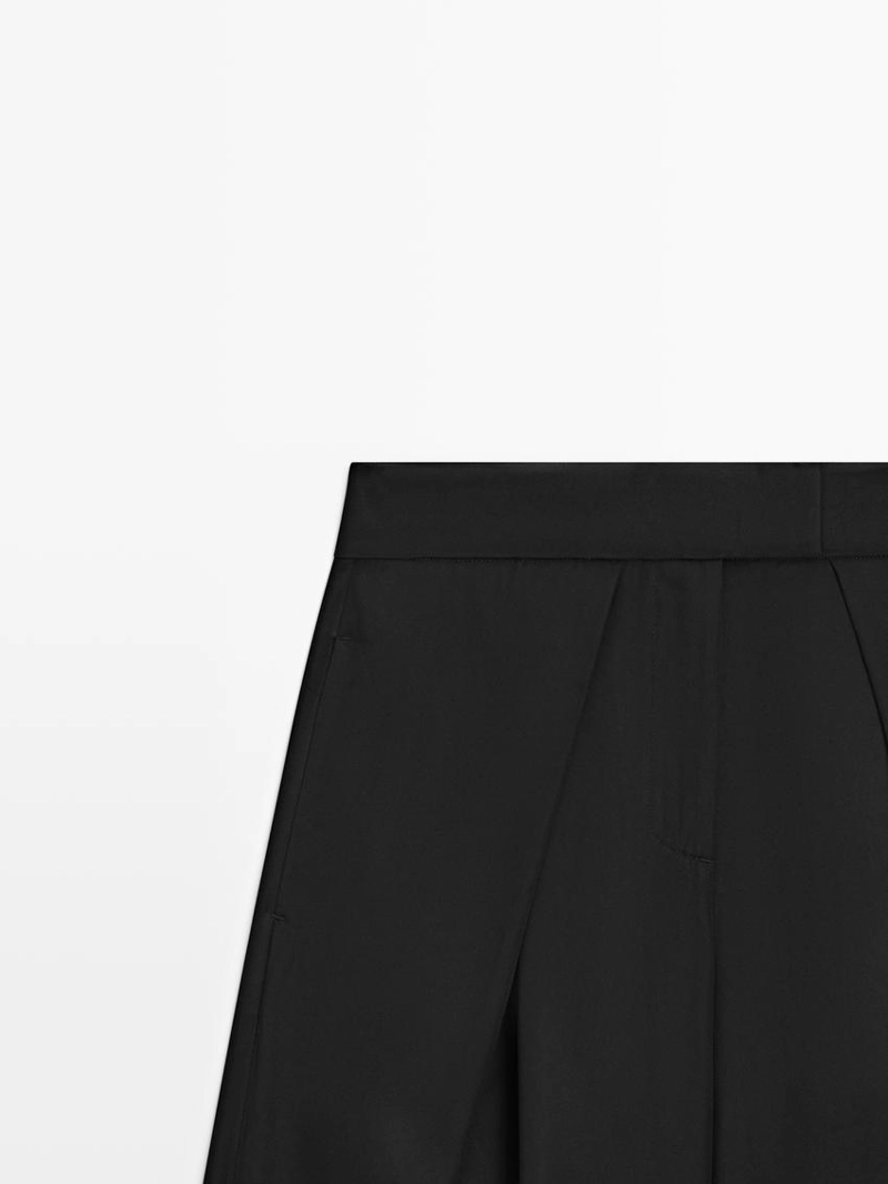 Брюки из атласа с защипами