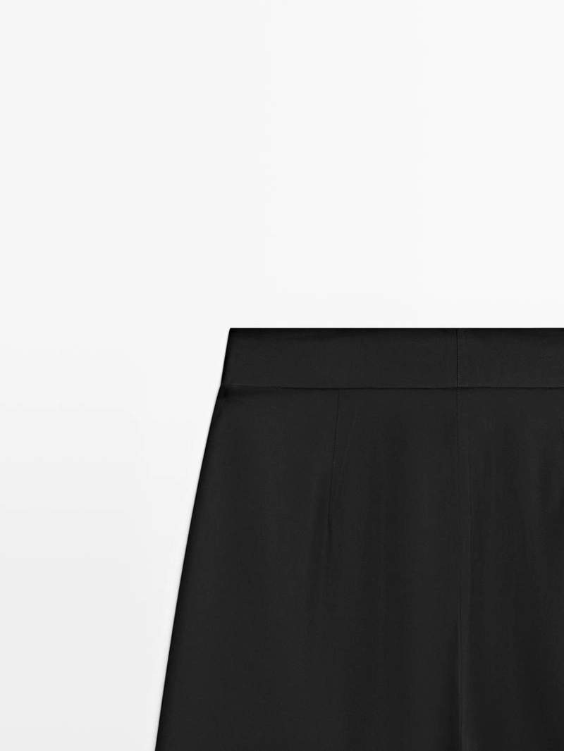 Брюки из атласа с защипами