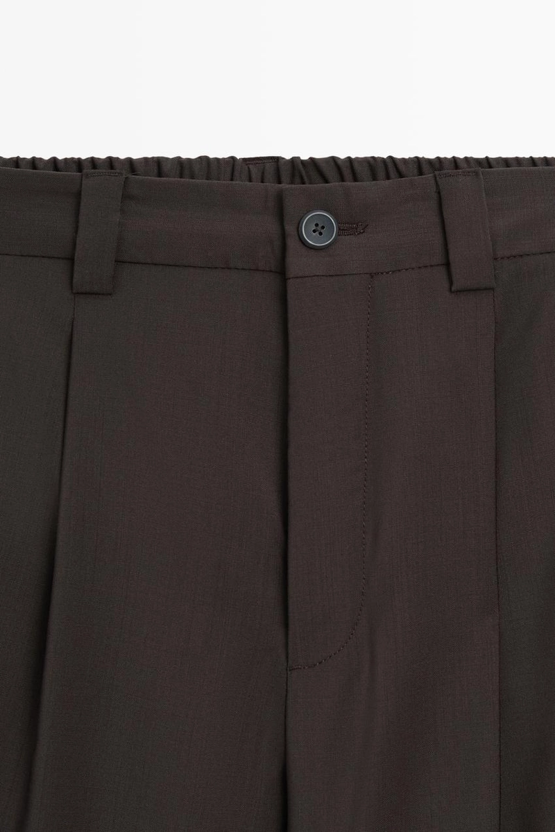 Брюки свободного покроя из прохладной шерсти с элементами ламантинов