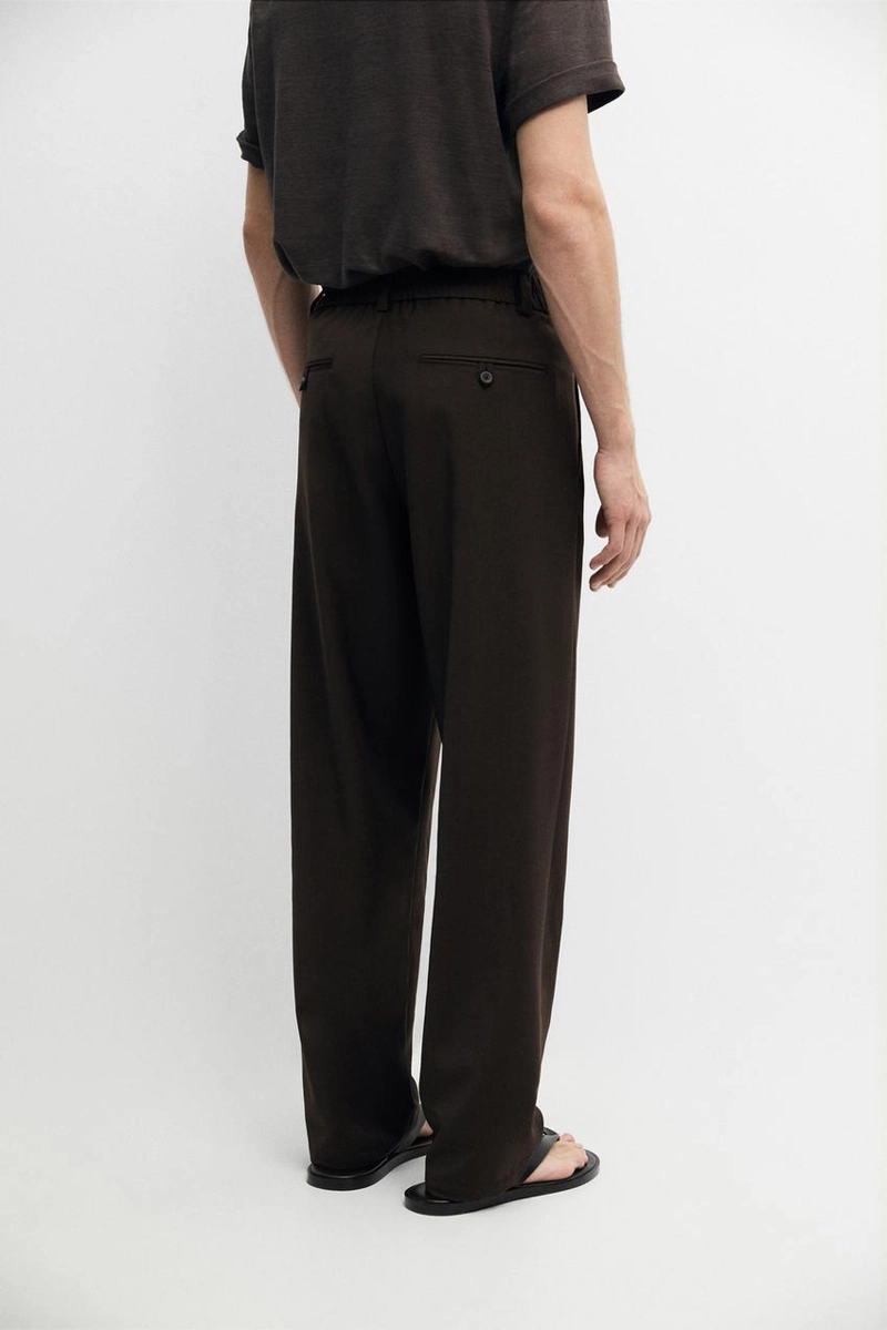 Брюки свободного покроя из прохладной шерсти с элементами ламантинов