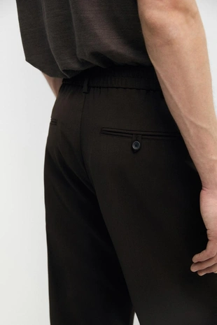 Брюки свободного покроя из прохладной шерсти с элементами ламантинов- Заказать в России