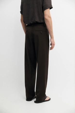 Брюки свободного покроя из прохладной шерсти с элементами ламантинов- Заказать в России