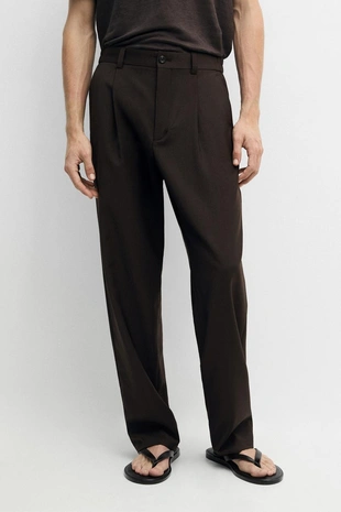 Брюки свободного покроя из прохладной шерсти с элементами ламантинов- Заказать в России