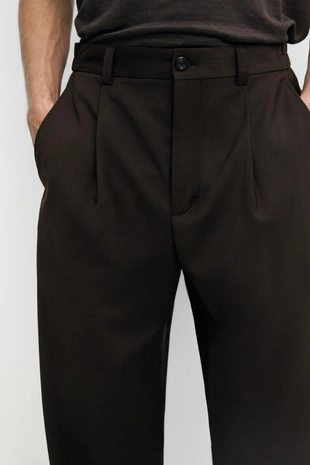 Брюки свободного покроя из прохладной шерсти с элементами ламантинов- Заказать в России