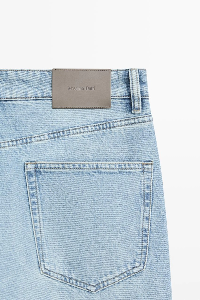 Джинсы с зауженным кроем