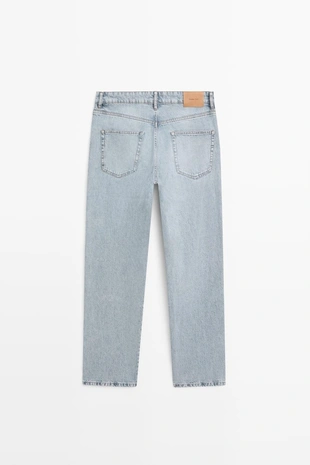 Джинсы из хлопка с зауженным кроем- Заказать в России