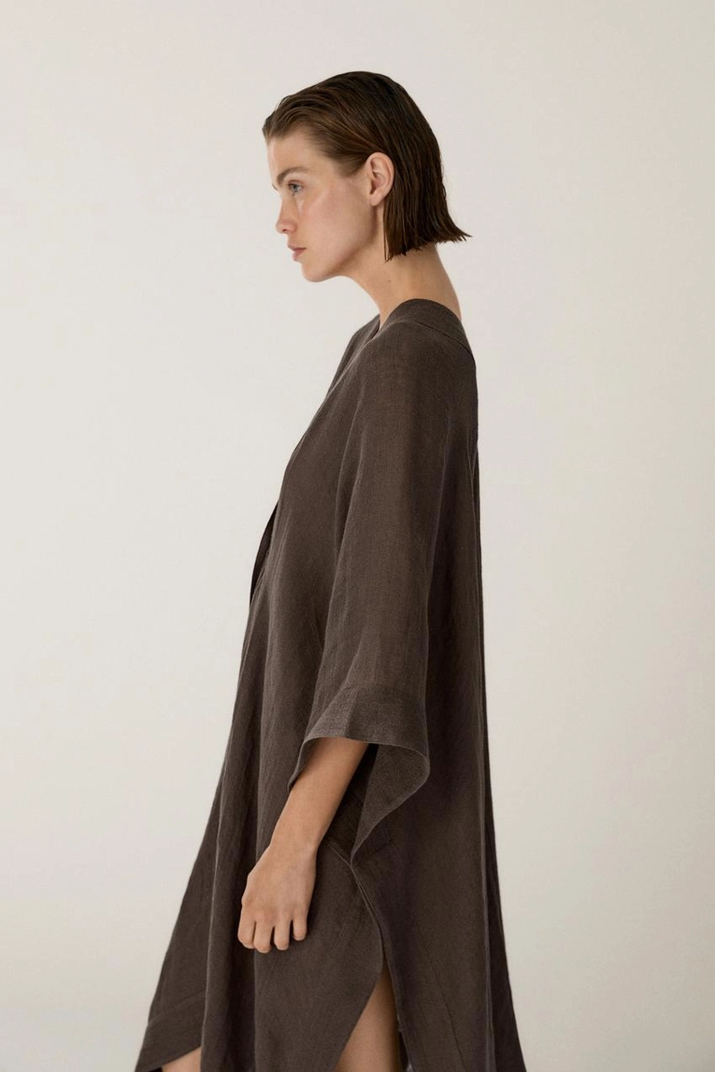 Раскатистая блузка oversize из 100% льна с деталями на спинке