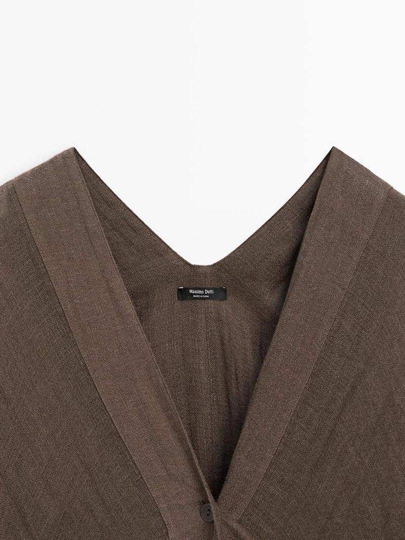 Раскатистая блузка oversize из 100% льна с деталями на спинке