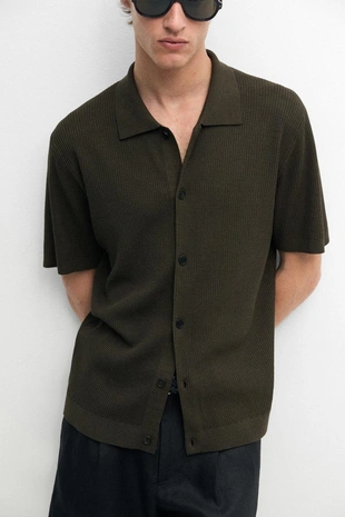 Поло из хлопкового смесового трикотажа с деталями на пуговицах- Заказать в России