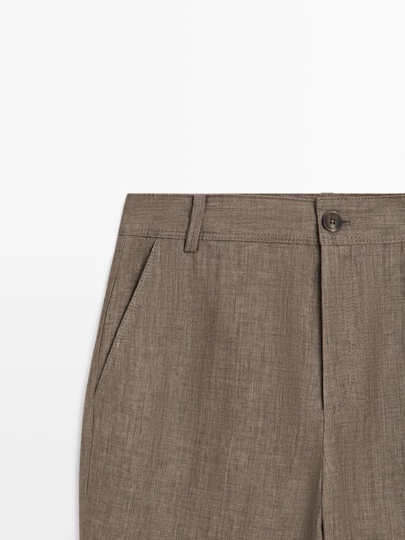 Брюки из льна с укороченным разрезом и зауженными штанинами