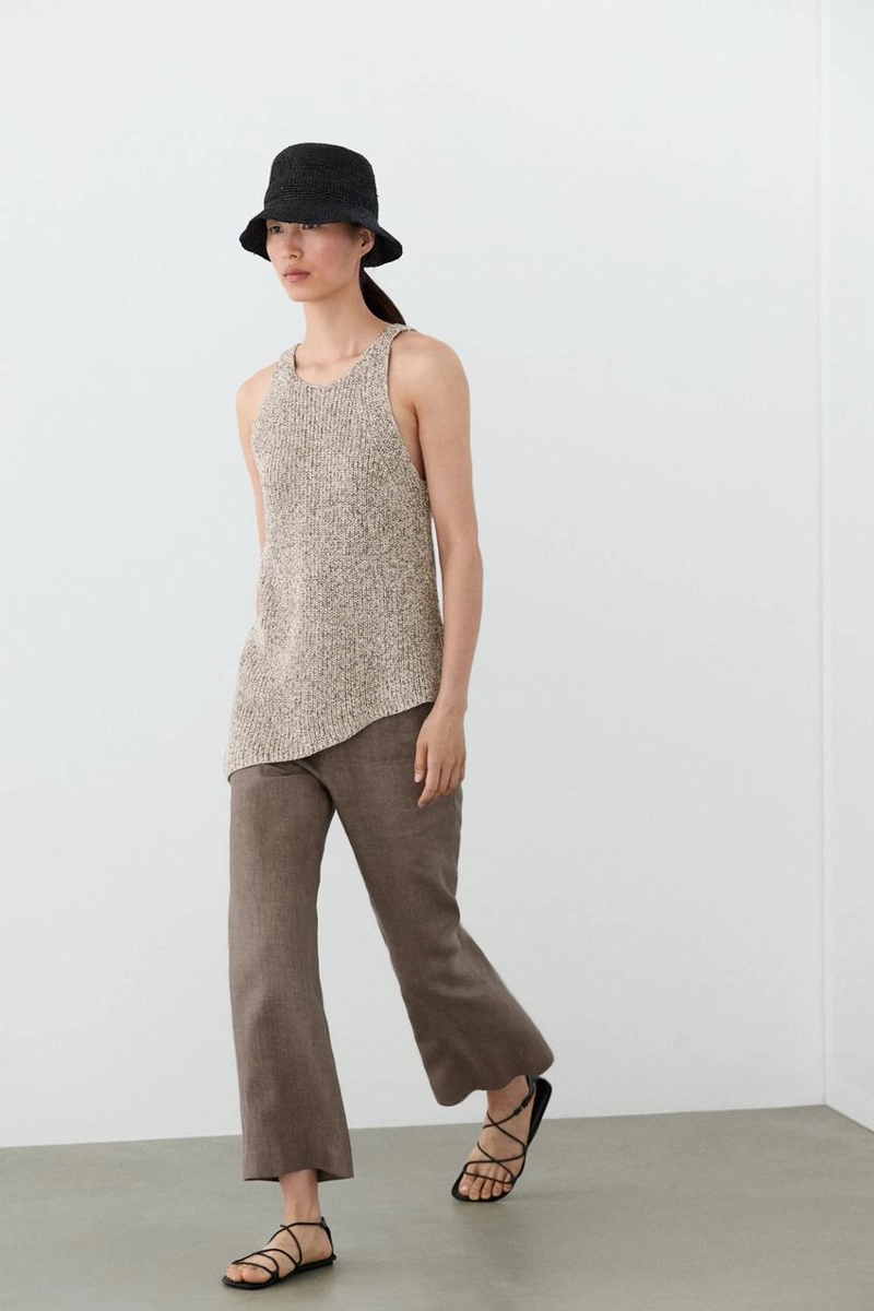 Брюки из льна с укороченным разрезом и зауженными штанинами