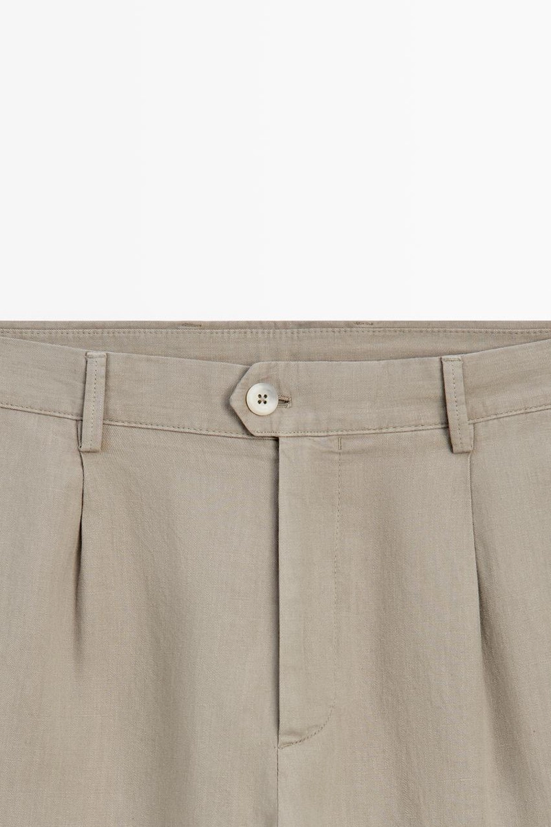 Прямые льняные и хлопковые брюки с линией вытачки