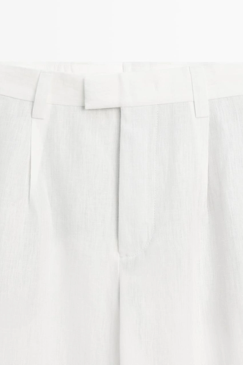 Брюки из 100% льна с защипами
