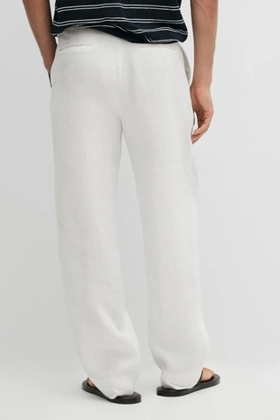 Брюки из 100% льна с защипами- Заказать в России