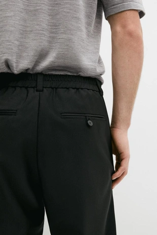 Брюки свободного кроя из шерсти с ластиком- Заказать в России