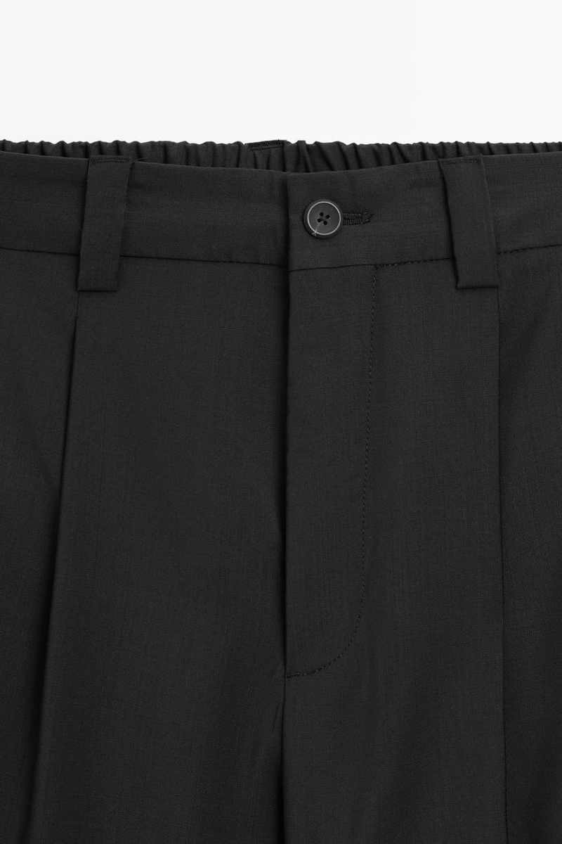 Брюки свободного кроя из шерсти с ластиком