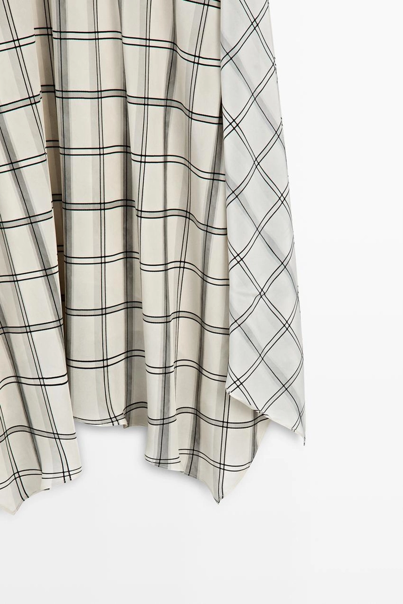 Асимметричная юбка миди с клетчатым узором