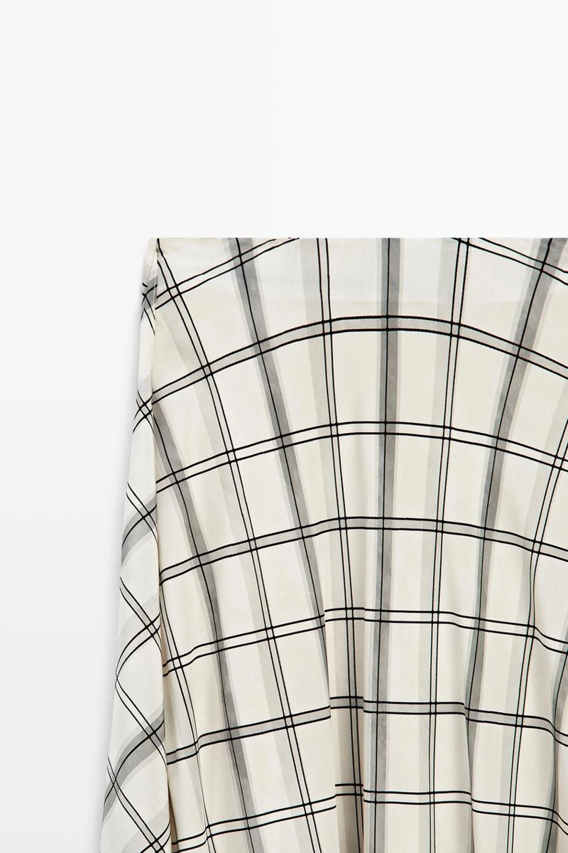 Асимметричная юбка миди с клетчатым узором