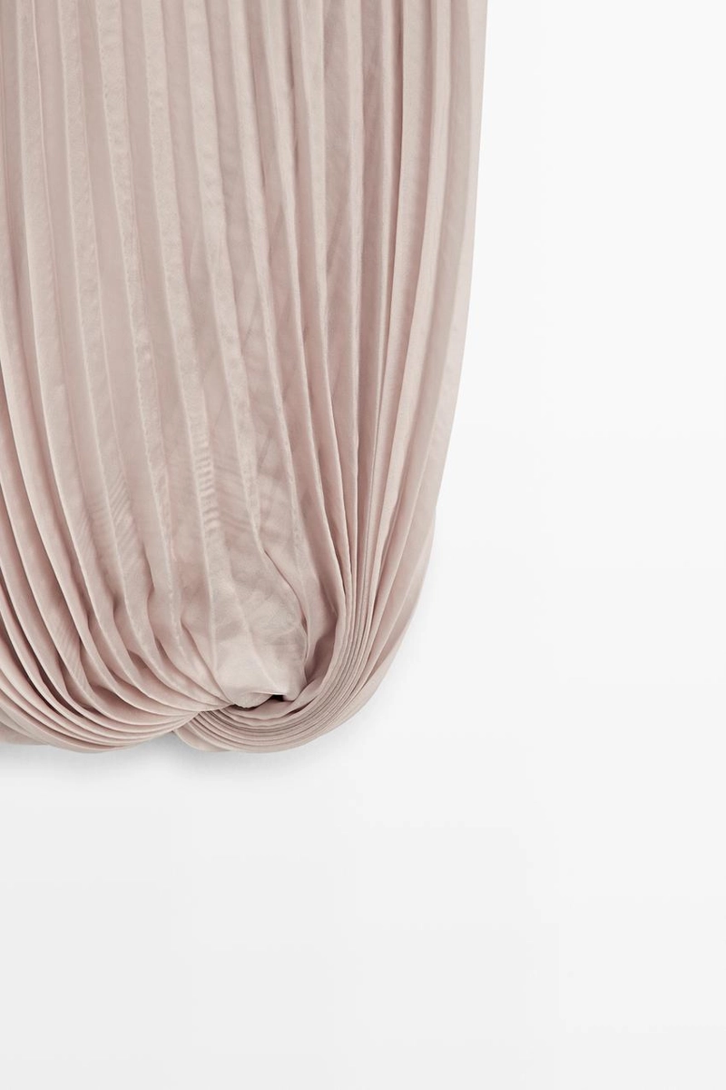 Плиссированная юбка средней длины с объемным подолом